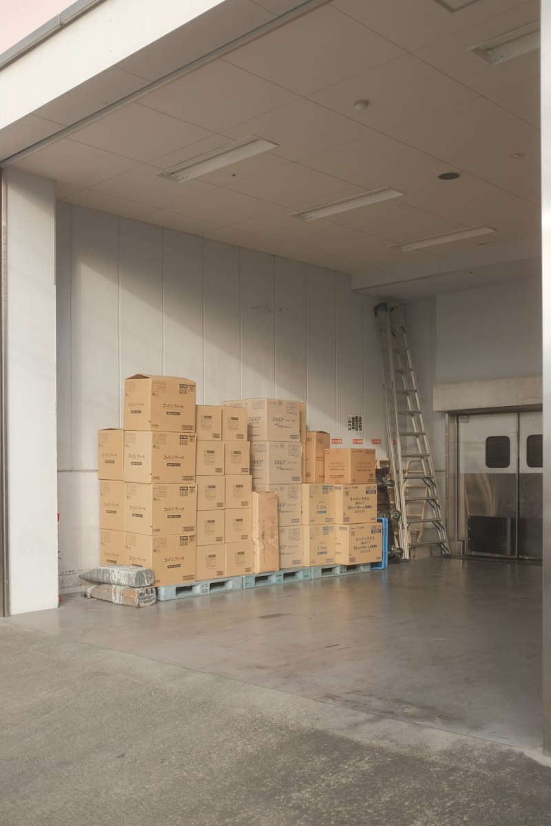 Stacked moving boxes on pallets